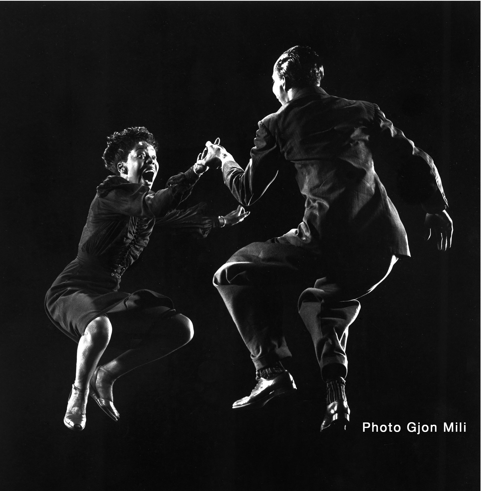 Leon James & Willa Mae Ricker demonstrating a step of The Lindy Hop.